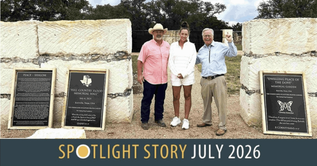 Group standing in front of Hiill Country Flood Memorial